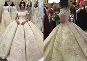 African Dubai Arab Lace Ball Gown Weddings Dresses Full Applique Beads Country Wedding Dress Sweep Train Short Sleeve Boho Bridal Gown Plus
