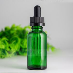 30mlガラス瓶の滴り澄んだ琥珀色の青い緑1oz e液体化粧品の蓋とピペットの滴