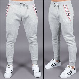 Outono New Men's Sports Calças Musculosos Pés Slim Pants Calças de Algodão Running Workout Roupas