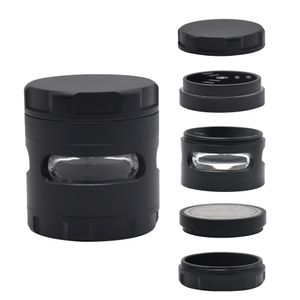 Il più nuovo design della finestra di vetro Alluminio Metallo Tabacco da fumo Herb Grinder 61MM 4 Strati Spice Crank Hand Tobacco Dry Herb Muller Grinder Screen