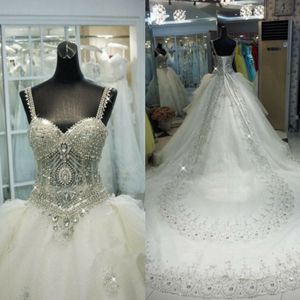Bling bling rhinestone kristaller bröllopsklänningar med avtagbara kjolar underbara en linje spaghetti sopa tåg brudklänningar