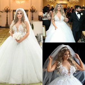 Plus Size Ballkleider Brautkleider Puffy Tiefer V-Ausschnitt Illusion Brautkleider Spitzenapplikationen Dubai Arabisches Hochzeitskleid