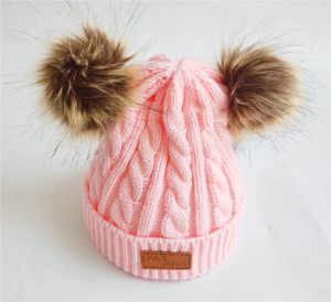 Cappelli di lana lavorati a maglia per bambini Pon Pon con pon pon di pelliccia sintetica Berretti all'uncinetto Inverno caldo neonato Bambini Ragazzi Ragazze Berretto Accessori per capelli