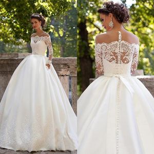 Abiti da sposa sexy eleganti con scollo a cuore Abiti da principessa con collo trasparente e maniche lunghe, con bottoni sul retro, Applicazioni in pizzo, Abiti da sposa Vestido De Novia