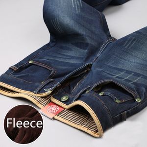 Jeans spessi caldi in pile invernale da uomo Jeans slim dritti maschili di nuova moda