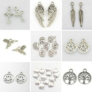 Wholesale metal feather earrings for sale - Group buy Vintage Silver Mixed Metal Feather Heart Cross Charms Wing Pentagram Angel Yin Yang Moon Knot Pendants for Bracelet Earring Necklace Jewelry
