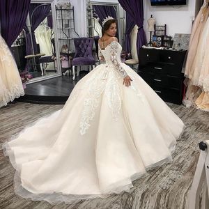 Gorgeous Luxury Beaded Lace Ball Gown Wedding Dresses Applique Sheer Neck Långärmad Plus Storlek Bröllopsklänning Bridal Robe de Mariage