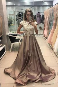 Vestidos de Fiesta Afircan Prom Dresses Bateauレースアップリケキャップスリーブライン長いアフリカのイブニングフォーマルドレス甘い16 Quinceanera