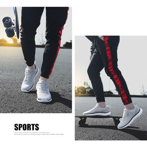 Sommar mode kvinnor män springskor svart grå vit sporttränare sneakers andas hemlagad märke tillverkat i porslin storlek 39-44