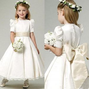Hübsches Mädchen-Erstkommunion-Kleid, kurzärmelig, große Schleife, A-Linie, Satin, Blumenmädchenkleid, lange Kinder-Festzug-Kleider nach Maß