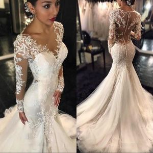 Wspaniałe koronkowe sukienki ślubne syreny 2019 Dubaj African Arabski styl drobny długie rękawy suknie ślubne plus rozmiar