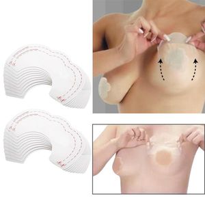 10個の女性のファッションセクシーな裸の乳房上昇テープの接着剤押下乳首のステッカーのペーストニップルカバーリフターブラジャーアクセサリーC18122601