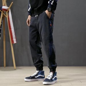 Japansk stil mode män jeans lös passform Stripe Spliced ​​Designer Cargo Byxor Harem Jeans Streetwear hip hop män joggare