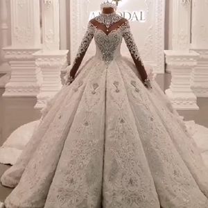 Luxury Crystal Beaded Applique Lace Ball Gown Wedding Dress High Neck Sheer Långärmad Hollow Back Vestido de Noiva Bride Dress