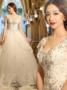 2020 Vintage Lace Beading Crystal Ball Gown Bröllopsklänning med Tassel Cap Sleeves Golvlängd Brudklänningar Vestidos de Mairee