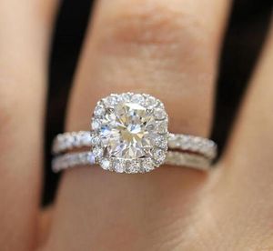 ダイヤモンドリング新しいトレンディな水晶婚約爪デザインの熱い販売リング女性ホワイトジルコンキュービックエレガントなリング女性の結婚式の宝石類