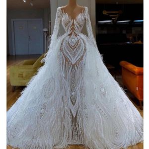 Luksusowe pióra Overtkirts Suknie Ślubne Arabskie Długie Rękawy Aplikacje Koraliki Sheer Neck Syrenka Sukienka Bridal Vestidos de Noiva