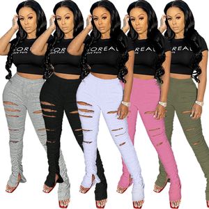 Spot Pants European och American Women's Explosive Nightclub Service Hole Solid Color Sweater Fabric Fold Split Micro La Sweat