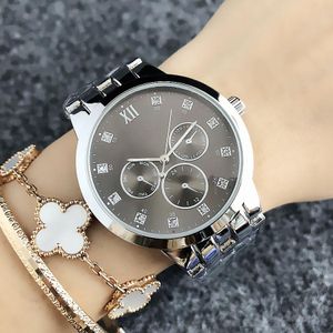 Мода Марка наручные часы для женщин девушка 3 циферблаты стиль стальной металл группа кварцевые часы TOM 6670