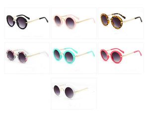 Dzieci okrągłe okulary przeciwsłoneczne Boys Sport Shade Sun Glass Girl Flower Drukuj Eyewear Dzieci Letnie Plażowe Akcesoria Krajowe Akcesoria Tzyq1053