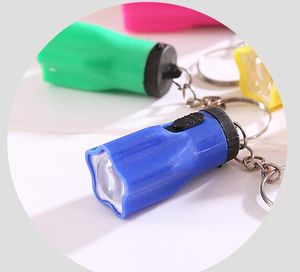 700pcs Пластиковые Led Flsahlights Super Mini Tazer с Key Ring Портативный Для Открытый Туризм Отдых на природе Факел Цветок Лепесток Форма