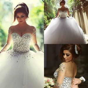 New Bling Puffy Ball Gown Wedding Dresses Arabic Sheer Neck Crystal Beaded Long Sleeves Hollow Back Court Train Tulle Plus Size Bridal Gowns