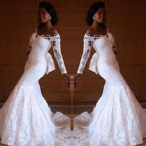 Abiti da sposa a sirena in pizzo retrò 2019 Abiti da sposa a maniche lunghe trasparenti sudafricani Sweep Train Abiti da sposa su misura