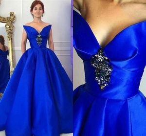 Unik designad V-Neck Royal Blue Pageant Evening Dresses With Pockets Crystal Draped Ball Gown Prom Sweet 16 Dress Formal Party Dress