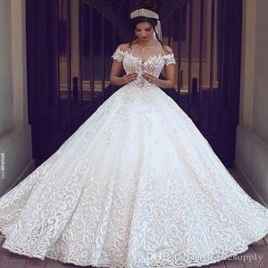 Nuovi abiti da sposa in pizzo vintage 2019 Sexy spalle scoperte maniche corte applique Sweep Train A Line abiti da sposa sexy realizzati su misura