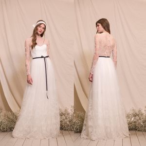 Divine Atelier Long Sleeve Beach Wedding Dresses Jewel Neck Hollow Back Appliques Tulle A Line Wedding Dresses Sweep Train Boho Bridal Gowns