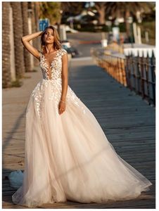 Designer Bohemain Wedding Dresses With Appliques A Line Illusion Lace Long Train Church Castal Wedding Gowns 2020 Cheap Beach Wedding Bridal