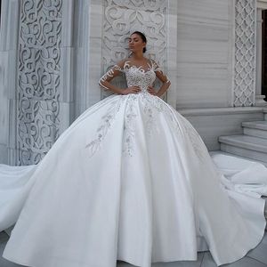 Ballkleid-Hochzeitskleider, transparent, mit Juwelenausschnitt, 3D-Blumenapplikation, Perlen, lange Ärmel, Brautkleider, maßgeschneiderte Roben de Mari￩e