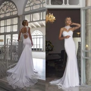 Riki Dalal 2019 Sexy Suknie ślubne Mermaid Open Back High Neck Illusion Suknie Ślubne Koronkowe Aplikacje Fit and Flare Syrenki Suknie Ślubne