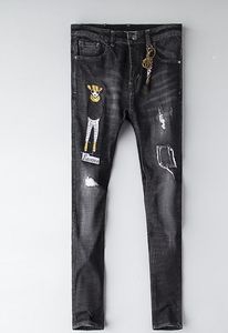 Gorący Sprzedawanie! Designer Dżinsy Męskie Zgryzione Ripped Skinny Spodnie Luksusowe Odzież Slim Motocykl Moto Biker Hip Hop Denim Mężczyzna Haft Pszczoła