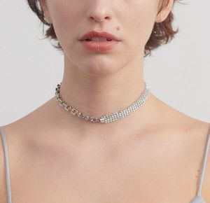Justine Centquet Splicing inlaidダイヤモンド鎖骨チェーンファッション人格ヒップホップの女性のネックレス
