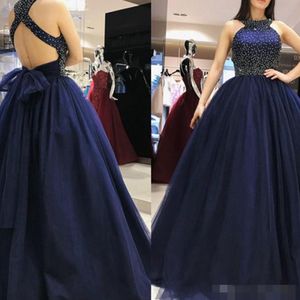 Os mais recentes vestidos de baile azul marinho halter miçangas mangas lantejas de piso