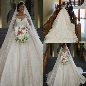 Gorgeous South African Lace Bröllopsklänning Sheer Neck Puffy Long Train Appliques Button Back Bridal Gowns Luxury Country Plus Storlek Billiga 2019
