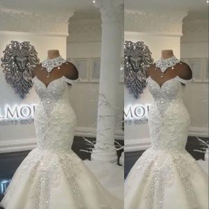 Neue Sexy Luxus Dubai Arabisch Meerjungfrau Brautkleider High Neck Illusion Spitze Applikationen Kristall Perlen Hohl Zurück Tüll Formale Bri256P