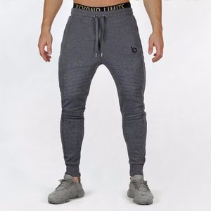 Mens Jogger Fitness Pants Casual Stretch Cotton Mens Fitness Exercise Embroidered Tights Sports Pants Jogging Asian Size M-2XL