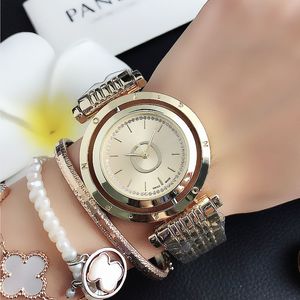 Modemarke Uhren Damen Mädchen Kristall Rotierendes Zifferblatt Stil Metall Stahlband Quarz-Armbanduhr P67