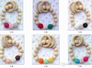 Mordedores Natural Wood Circle jogo do bebê Gym Chew faia Baby Teething Beads Shower Gift Bed Brinquedos recém-nascido Teether TROTTIE chocalhos 20pcs YE016