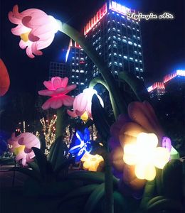 Bühnenhintergrund, dekorativ, 6 m hoch, riesige simulierte tropische Regenwald-aufblasbare Blumenpflanze mit LED-Lichtern für Nachtparty-Dekoration