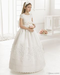 Abiti da prima comunione per ragazze Scoop Backless Appliques Flower Girls Dress Archi Tulle Ball Gown Pageant Abiti per bambine