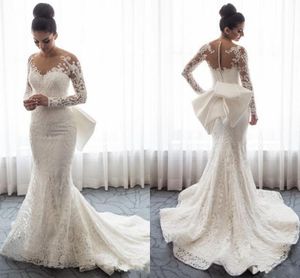 Underbara nigerianska spets Afrikanska bröllopsklänningar 2019 Avtagbar tåg Stor båge Illusion Långärmad Sheer Neck Vestido de Novia Bridal Gown