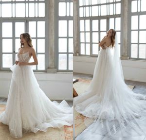 2020 Sexy Doria Karlozi Wedding Dresses سباغيتي حزام بلا أكمام اللؤلؤ العروس اللباس خط الاجتياح القطار Tulle Abiti Da Sposa
