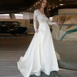 فستان زفاف طويل الأكمام ضد الرقبة خط خط الدانتيل أعلى ساتان تنورة ثوب الزفاف مع جيب مخصص فستان العروس مصنوع
