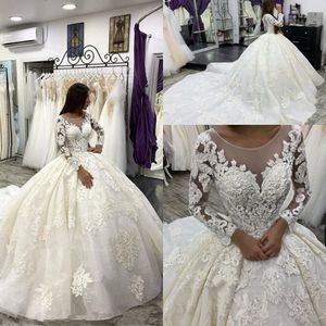 Saudiarabien Vintage Ball Gown Bröllopsklänningar Sheer Långärmade Snöre Appliqued Bridal Gowns Sheer Neckline Puffy Kjol Vestidos Al3484