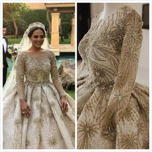 2020 Plus Size Arabic Luxurious Sparkly Sexy Wedding Dresses Beaded Crystals Pearls Bridal Dresses Long Sleeves Wedding Gowns ZJ101