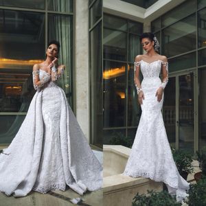 Sexiga off-shulder långärmade spets sjöjungfru bröllopsklänningar med avtagbart tåg Lyx applikation pärlstav Dubai arabiska brudklänningar