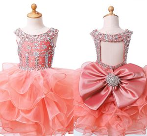 Cute Light Coral Baby Girls Korant Suknie Big Bow Crystal Organza Ruffle First Holy Communion Dress Specjalne okazje Urodziny